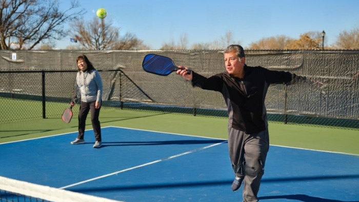 Players Playing Pickleball By Using Textured Pickleball Paddles