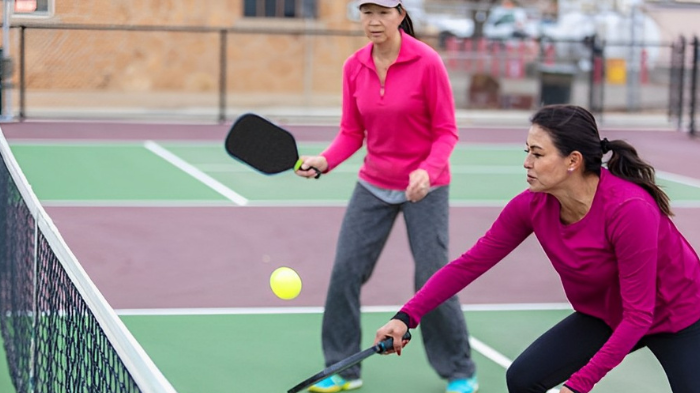 A Tennis Player Learning Pickleball
